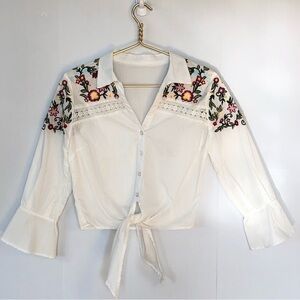 White front tie cropped shirt with multi colored floral embroidery flared sleeve